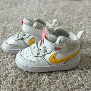 Nike Kids White Sneakers with Yellow and Pink Accents